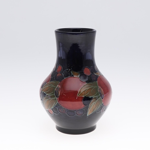 755 - ANTIQUE MOORCROFT VASE & SMALL POT - POMEGRANTATE. The vase of squat form and painted in the Pomegra... 