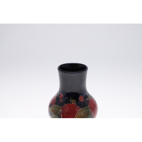 755 - ANTIQUE MOORCROFT VASE & SMALL POT - POMEGRANTATE. The vase of squat form and painted in the Pomegra... 