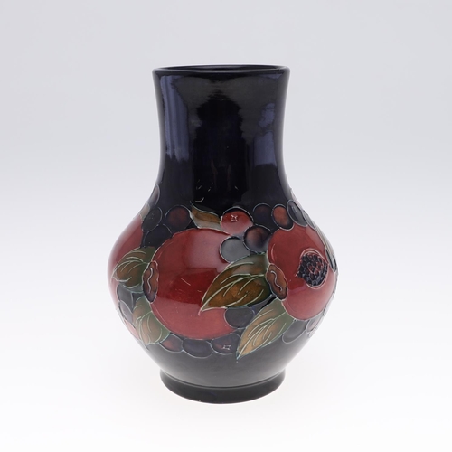 755 - ANTIQUE MOORCROFT VASE & SMALL POT - POMEGRANTATE. The vase of squat form and painted in the Pomegra... 