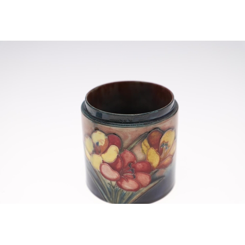 761 - MOORCROFT FLAMBE VASE & LIDDED BOX. A small squat vase painted in the Anemone design with a flambe g... 