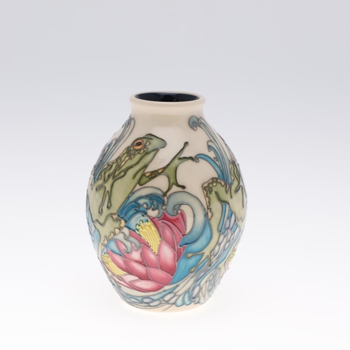 762 - MODERN MOORCROFT VASE - FROGGY SPLASH. A modern vase painted with Frogs and aquatic plants on a whit... 