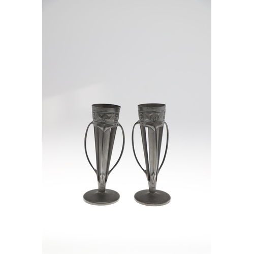 768 - PAIR OF LIBERTY TUDRIC PEWTER VASES & JUG. A pair of spill vases, Model No 0957, each with three ten... 