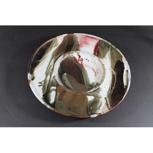 769 - TIM ANDREWS (BORN 1960) - LARGE STONEWARE DISH. (d) A large dish or charger with a circular well, wi... 