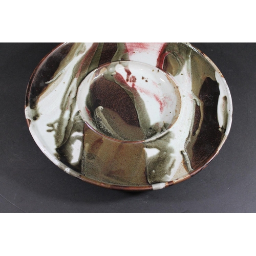 769 - TIM ANDREWS (BORN 1960) - LARGE STONEWARE DISH. (d) A large dish or charger with a circular well, wi... 