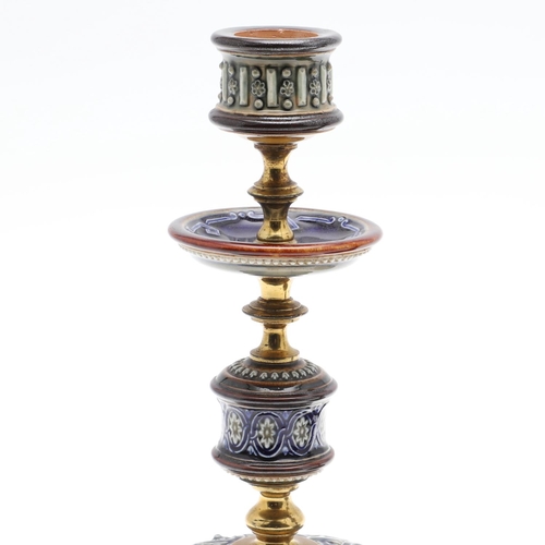 774 - A PAIR OF DOULTON LAMBETH STONEWARE AND BRASS CANDLESTICKS. c.1900, incised guilloche and foliate de... 