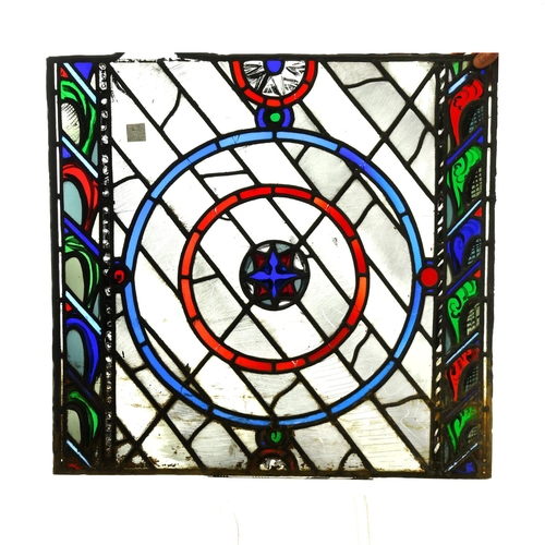 777 - STAINED GLASS PANELS - STUDIO OF PATRICK REYNTIENS. Two large stained glass panels, one with a circu... 