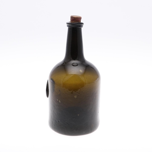 779 - 18THC GLASS SEAL BOTTLE - 1785. The olive green bottle with a tapering neck, string rim and cylindri... 