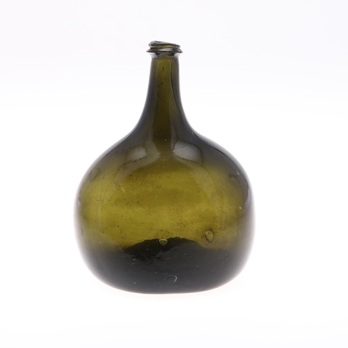 781 - 18THC GLASS BOTTLE. An olive green bottle with a tapering neck and string rim, the body of flattened... 