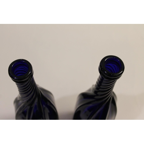 782 - PAIR OF BLUE GLASS DECANTERS & WINE LABELS INCLUDING VICTORIAN SILVER BRANDY LABEL. A pair of blue g... 