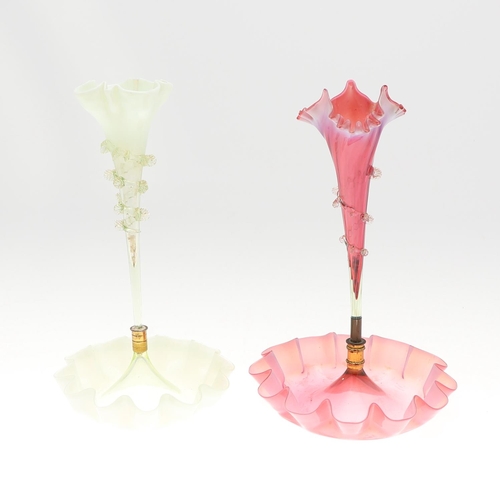 784 - TWO VICTORIAN GLASS EPERGNES. Two similar glass epergnes or centrepieces with single stem trumpets, ... 