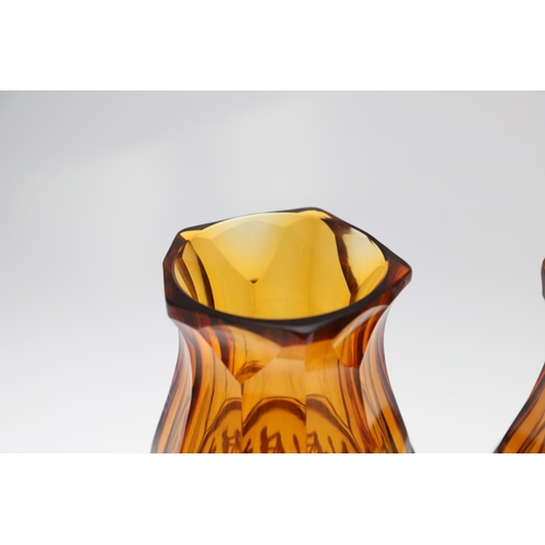 789 - PAIR OF CONTINENTAL MOSER STYLE GLASS VASES. A large pair of amber coloured glass vases, the top and... 