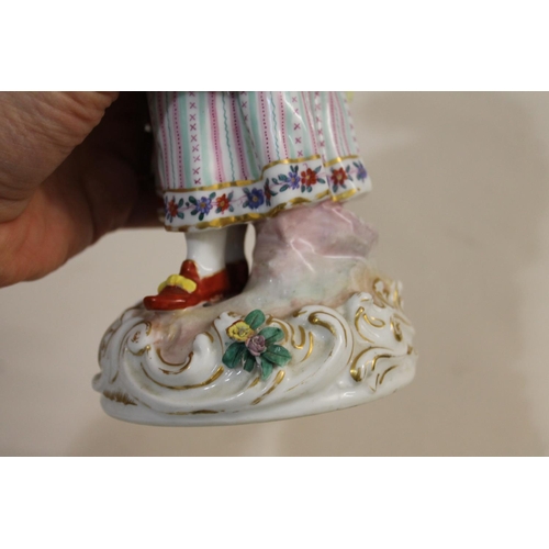 792 - A PAIR OF MEISSEN PORCELAIN FIGURES OF A LADY AND GENTLEMAN. A pair of Meissen figures, including a ... 