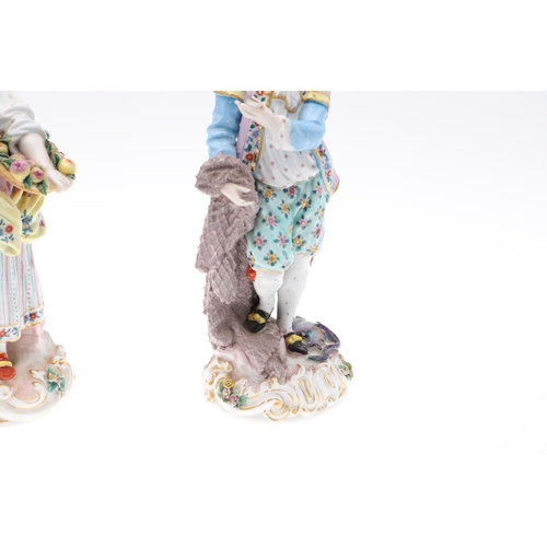 792 - A PAIR OF MEISSEN PORCELAIN FIGURES OF A LADY AND GENTLEMAN. A pair of Meissen figures, including a ... 