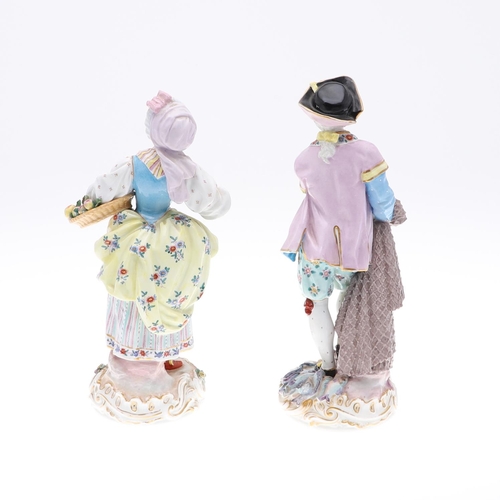 792 - A PAIR OF MEISSEN PORCELAIN FIGURES OF A LADY AND GENTLEMAN. A pair of Meissen figures, including a ... 