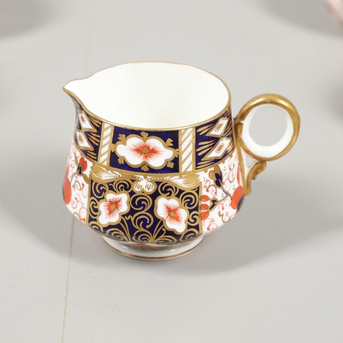 801 - A ROYAL CROWN DERBY IMARI TEA SET. pattern 2451, twelve person setting, comprising cups and saucers,... 