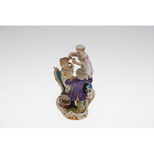 803 - MEISSEN PORCELAIN FIGURE GROUP - YOUNG CHILDREN. Late 19thc, modelled with a seated young girl  with... 