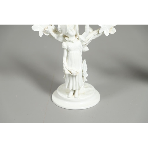 806 - PAIR OF 19THC MOORE BROS PORCELAIN CANDLESBRA. A pair of figural triple branch candelabra, each mode... 