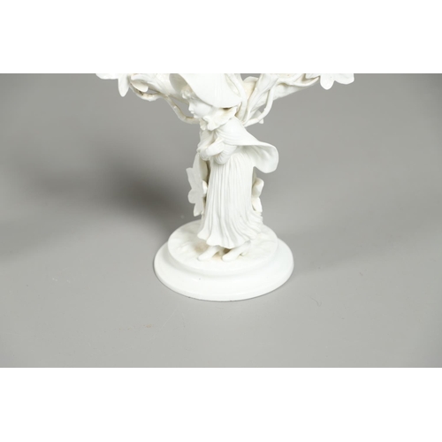 806 - PAIR OF 19THC MOORE BROS PORCELAIN CANDLESBRA. A pair of figural triple branch candelabra, each mode... 