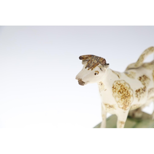 807 - WHIELDON COW CREAMER & TWO OTHER 19THC COW CREAMERS. A Whieldon cow creamer with a rectangular cante... 