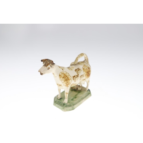 807 - WHIELDON COW CREAMER & TWO OTHER 19THC COW CREAMERS. A Whieldon cow creamer with a rectangular cante... 