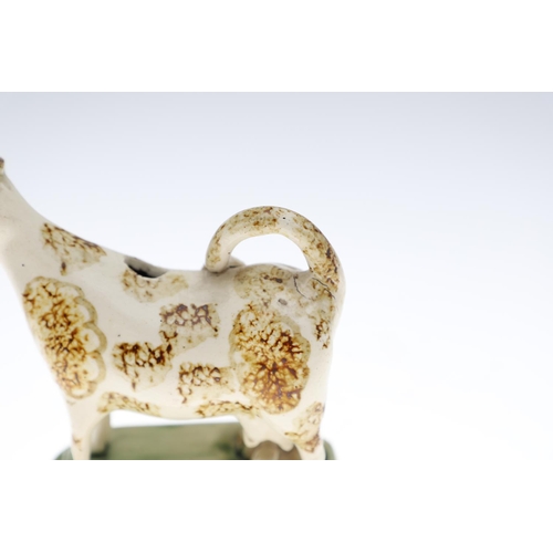 807 - WHIELDON COW CREAMER & TWO OTHER 19THC COW CREAMERS. A Whieldon cow creamer with a rectangular cante... 