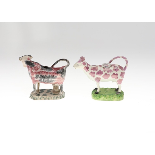 808 - 19THC PEARLWARE COW CREAMERS. Including two similar Cow Creamers with splashes of purple lustre, and... 