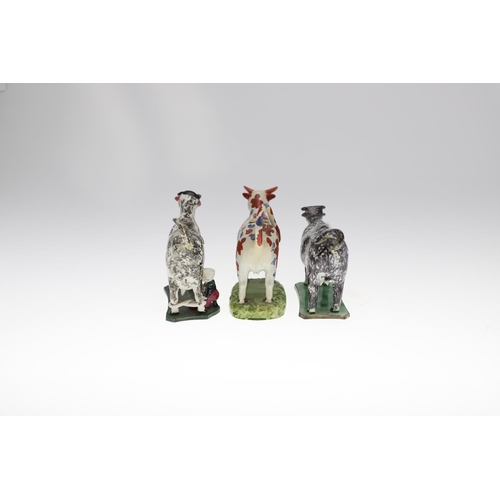 809 - 19THC PRATTWARE COW CREAMER & TWO OTHER COW CREAMERS. Attributed to 'St Anthony's Pottery', with bla... 