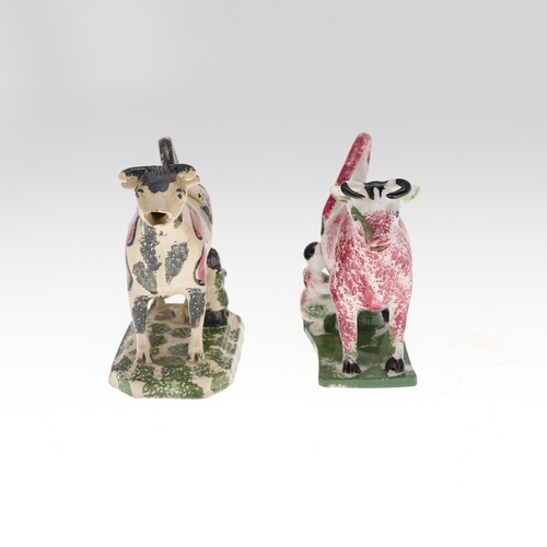 810 - 19THC COW CREAMERS. Four various Cow Creamers, each with sponge decoration and milkmaid to the base.... 