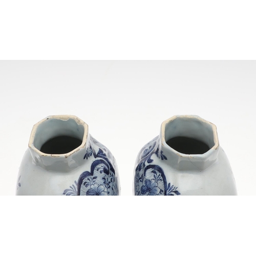 821 - PAIR OF ANTIQUE DELFT LIDDED VASES. 19th, the vases painted with two figures fishing within a landsc... 