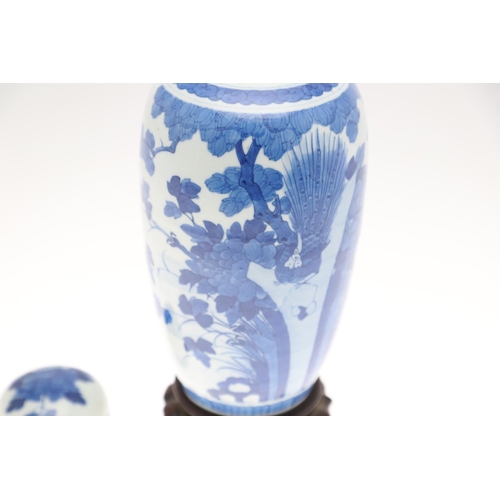 829 - 19THC CHINESE BLUE & WHITE LIDDED JAR, & A MINIATURE VASE/SNUFF BOTTLE. A late 19thc slender ovoid l... 