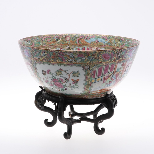 830 - LARGE 19THC CHINESE CANTONESE BOWL & WOODEN STAND. A large 19thc Chinese Cantonese bowl, the interio... 