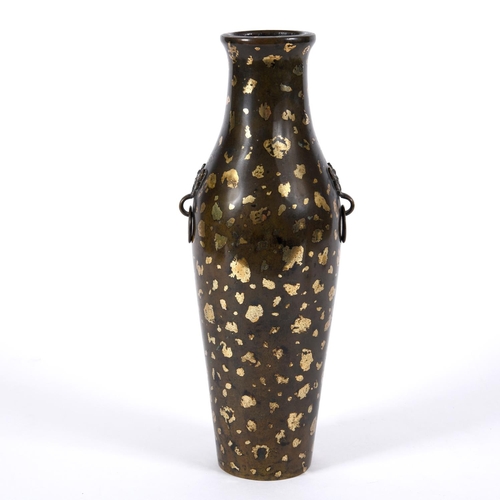 834 - CHINESE BRONZE GOLD SPLASH VASE. Probably 18thc, the large vase of slender form with mask handles su... 