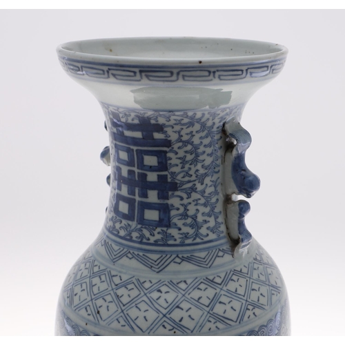 838 - A 19THC CHINESE PROVINCIAL BLUE AND WHITE VASE. A large provincial baluster vase, with sprays of flo... 