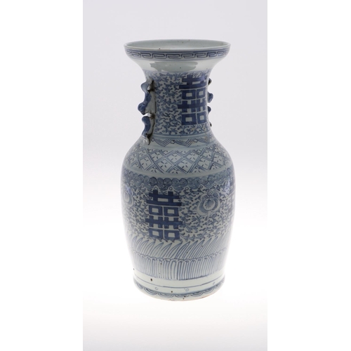 838 - A 19THC CHINESE PROVINCIAL BLUE AND WHITE VASE. A large provincial baluster vase, with sprays of flo... 