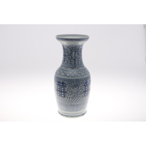 838 - A 19THC CHINESE PROVINCIAL BLUE AND WHITE VASE. A large provincial baluster vase, with sprays of flo... 