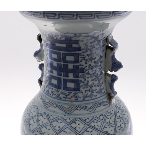 838 - A 19THC CHINESE PROVINCIAL BLUE AND WHITE VASE. A large provincial baluster vase, with sprays of flo... 