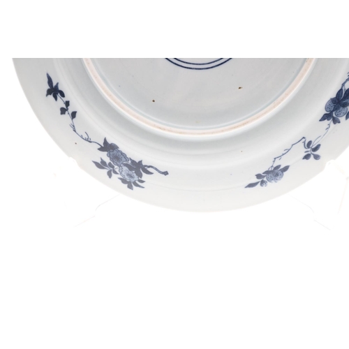 839 - CHINESE BLUE & WHITE PORCELAIN DISH & PORCELAIN DISH WITH METAL MOUNTS. A 20thc copy of a Kangxi dis... 