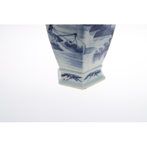 841 - PAIR OF 19THC CHINESE BLUE & WHITE VASES. A pair of 19thc vases of hexagonal shape, with applied Dog... 