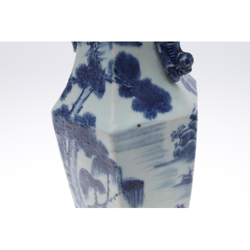 841 - PAIR OF 19THC CHINESE BLUE & WHITE VASES. A pair of 19thc vases of hexagonal shape, with applied Dog... 