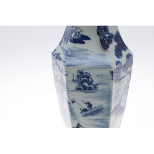 841 - PAIR OF 19THC CHINESE BLUE & WHITE VASES. A pair of 19thc vases of hexagonal shape, with applied Dog... 