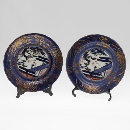 856 - PAIR OF LARGE 18THC JAPANESE IMARI DISHES. 18thc, the centre painted with flowering trees and gilded... 