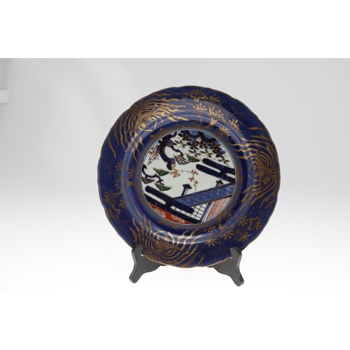 856 - PAIR OF LARGE 18THC JAPANESE IMARI DISHES. 18thc, the centre painted with flowering trees and gilded... 