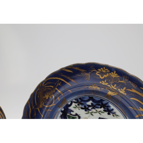 856 - PAIR OF LARGE 18THC JAPANESE IMARI DISHES. 18thc, the centre painted with flowering trees and gilded... 