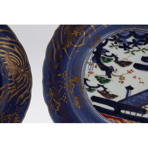 856 - PAIR OF LARGE 18THC JAPANESE IMARI DISHES. 18thc, the centre painted with flowering trees and gilded... 