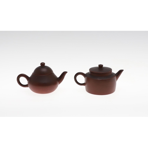 860 - CHINESE YIXING STONEWARE TEAPOTS. Probably Republic Period, Including two miniature stoneware teapot... 