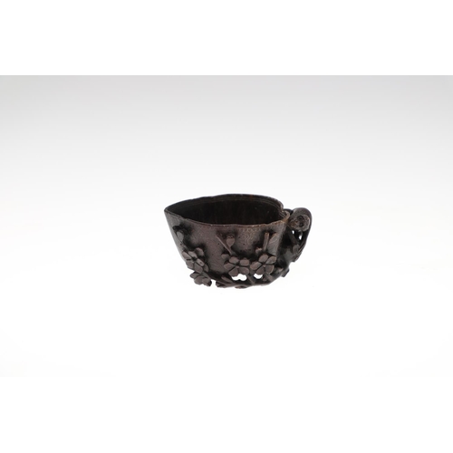 861 - CHINESE CARVED SOAPSTONE GROUP, & CARVED SAUCE BOAT. A white and black carved soapstone with a singl... 