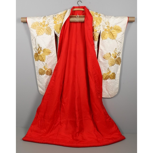 880 - JAPANESE CREAM SILK EMBROIDERED KIMONO, & ANOTHER SILK EMBROIDERED KIMONO. A 20thc large cream silk ... 