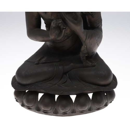 885 - LARGE BRONZE BUDDHA. Possibly Tibetan, the figure seated in meditation and with shou style symbols. ... 