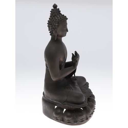 885 - LARGE BRONZE BUDDHA. Possibly Tibetan, the figure seated in meditation and with shou style symbols. ... 