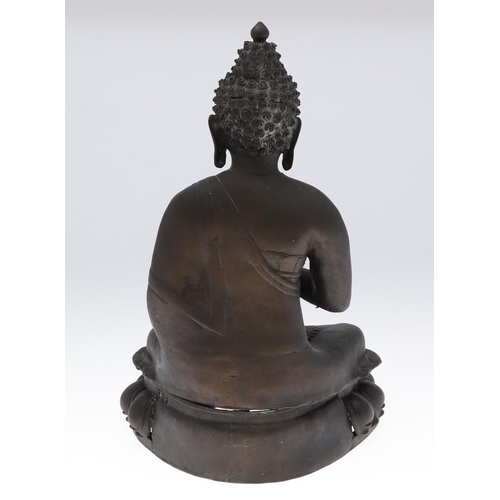 885 - LARGE BRONZE BUDDHA. Possibly Tibetan, the figure seated in meditation and with shou style symbols. ... 